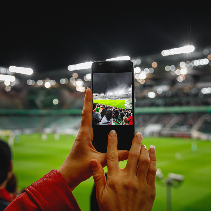 taking a picture of the stadium from a cell phone